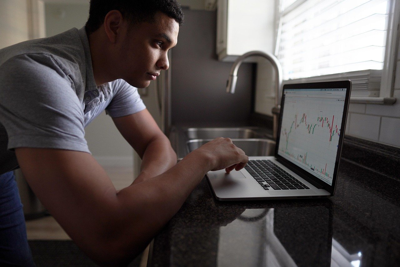 Man browsing for stocks